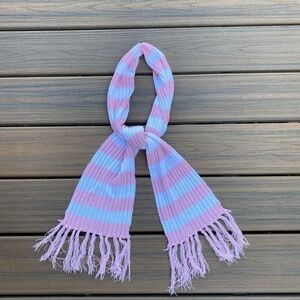 Pink and white striped scarf with fringe.